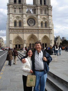 John and Gina Rice Travel Agents in front of Notre Dame Cathedral